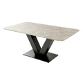 Moderne Eettafel met Marmeren Tafelblad en V-vormige Basis